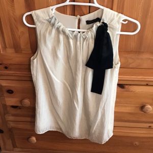 Silky shimmery cream blouse with black neck tie